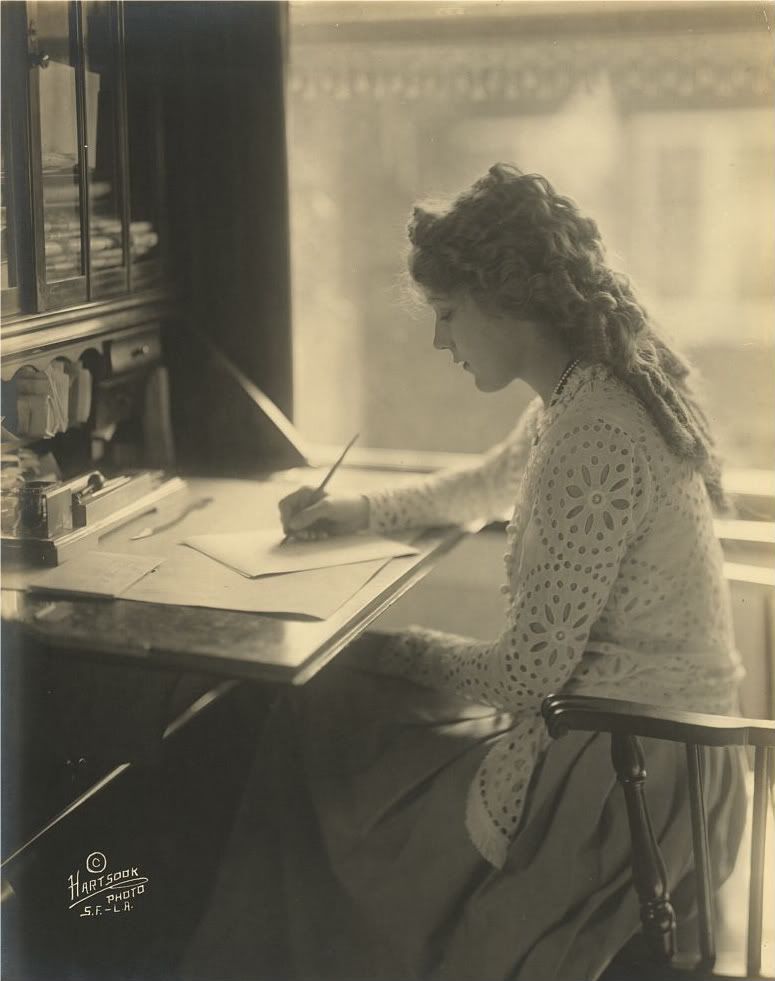 18840v-1.jpg Mary Pickford writing at a desk,c1918 Mar. 23.Hartsook Photo image by netmole